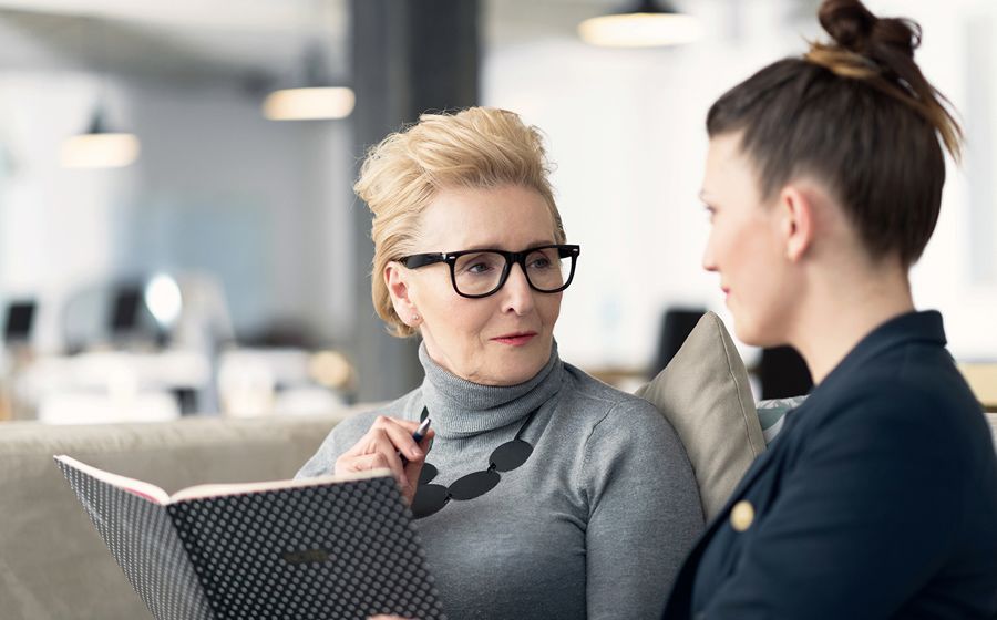 two people discussing AI strategy