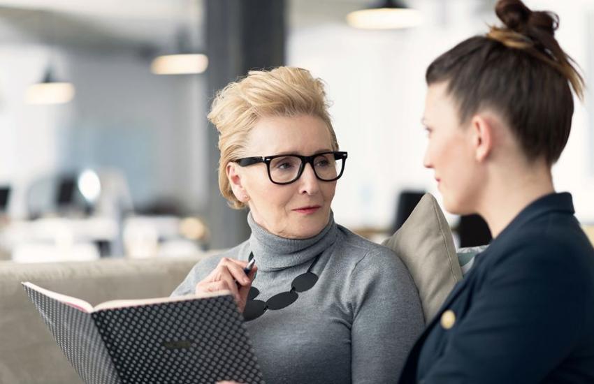 two people discussing AI strategy